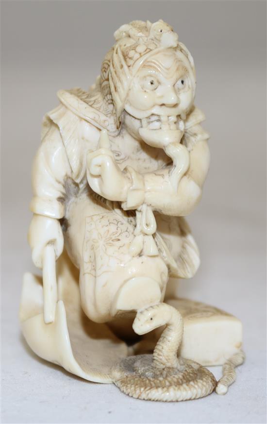 A Japanese ivory okimono of a bugaku dancer